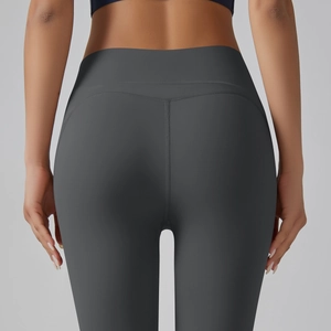 Rear view of high-waisted grey yoga pants showing seamless push-up fit and fabric texture