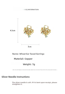Detail view of gold leaf tassel earrings with measurements and copper material info