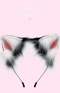 Close-up of realistic faux fur animal ears headband with soft texture and lifelike detail