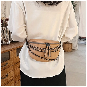 Detail of camel crescent waist bag with crocodile pattern and black metal chain decor