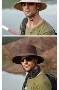 Détail de chapeaux de soleil beige et marron à larges bords avec cordons réglables