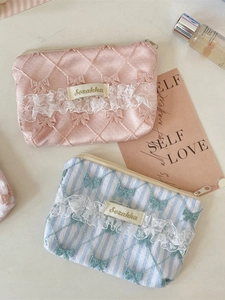 Lace-trimmed floral coin purse set in pink and blue stripes with zipper closure