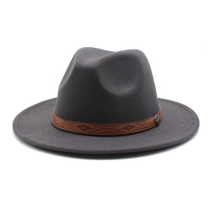 Detailed close-up of dark grey wide-brimmed wool fedora with embossed brown leather band