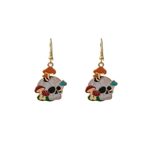 Close-up of gothic skeleton earrings featuring colorful 3D mushroom details and ear hooks