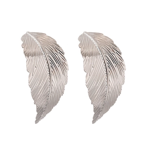 Elegant silver leaf stud earrings with detailed metallic feather texture for women