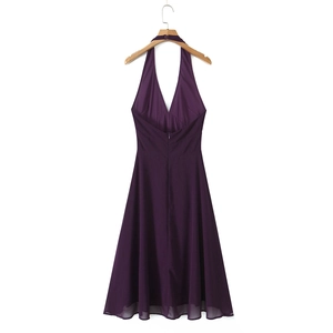 Detail view of purple chiffon halter dress featuring backless design and invisible zipper