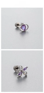 Macro detail of purple zircon heart and petal stud earrings with screw ball backs