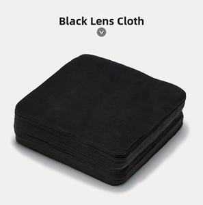 Close-up of premium black microfiber cleaning cloths stacked for sunglasses and screens
