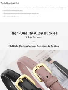 Close-up of slim leather belts with gold alloy buckles in black and mauve colors