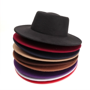 Detailed top view of wide-brimmed felt jazz hats in nine different solid colors