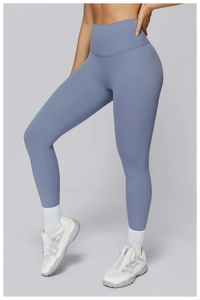 Detail view of high waisted fitness leggings in fog blue with wide tummy control band