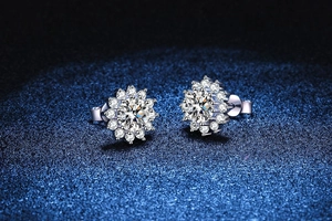 Macro shot of S925 sterling silver sunflower earrings with sparkling moissanite stones