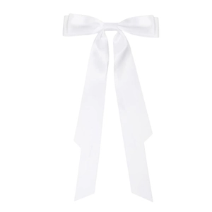 Detailed view of a long white satin bow hair clip with flowing ribbons on white background