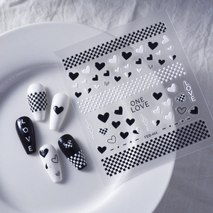 5D embossed nail stickers with black and white hearts, checkerboard patterns and LOVE text
