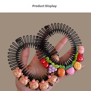 Detail of telescopic hair combs with cute brown bear and assorted fruit resin charms