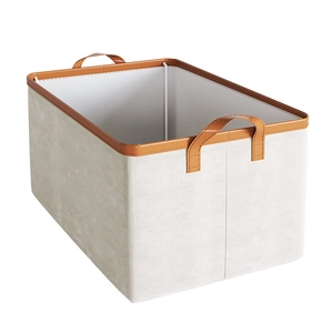 Foldable beige polyester cotton storage box with brown leather handles and steel frame