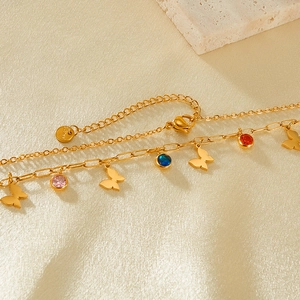 Detail of gold stainless steel double-layer necklace with colorful zirconia butterfly pendants