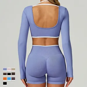 Seamless backless long sleeve yoga top and high waist shorts set in blue with white trim