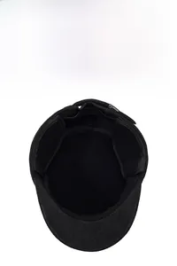 Detailed interior view of men's wool flat cap featuring thick warm lining and ear flaps