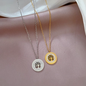 Minimalist Tree of Life necklace in gold and silver finish with crystal inlay and silk texture