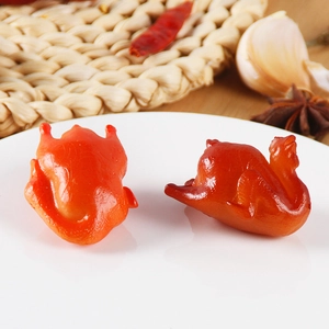 Realistic roasted chicken food model keychains on a white plate with spices