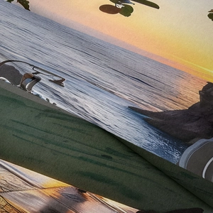 Close-up of soft bohemian sunset beach tapestry showing fine texture and digital print