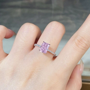 Close-up of S925 silver ring featuring a 2-carat radiant cut pink zircon on a hand