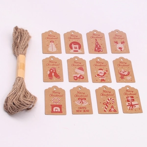 Detail of 12 kraft paper Christmas tags with reindeer and snowman prints and jute twine