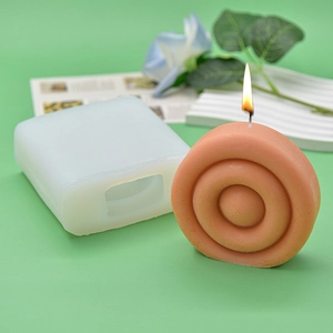 Spiral disc silicone candle mold and finished wax candle for DIY home decoration
