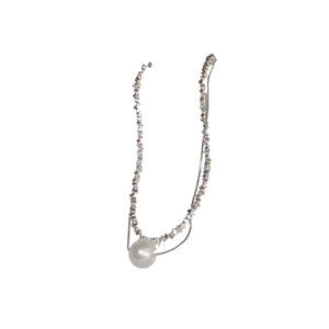 Double-layered silver necklace with white pearl pendant and faceted beaded chain design