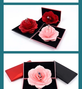 Detailed view of pop-up rose jewelry box with velvet interior for rings in various colors