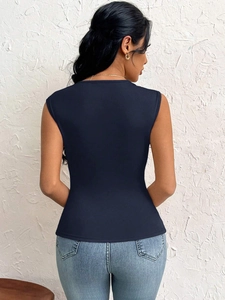Detail view showing the back of an elegant navy slim fit top for women with sleeveless cut