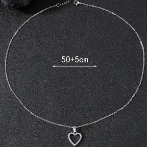 Detail of silver hollow heart pendant necklace with rhinestones and 50+5cm length spec