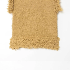 Chic camel-colored knit faux fur sweater with textured curly yarn and fringe hem details