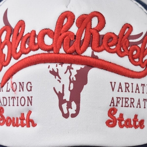 Macro shot of washed cotton baseball cap with 3D Black Rebel embroidery and vintage prints
