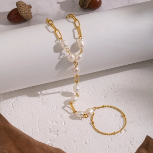 Elegant 18K gold plated stainless steel hand chain with natural freshwater pearls