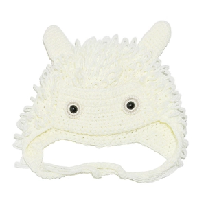 Detailed loop stitch texture on handmade crochet monster hat with ears and ties