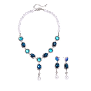 Vintage jewelry set with blue crystal pendants and white pearls on silver chain