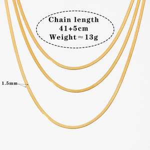 Detailed view of triple-layered gold snake chain necklace with size and weight specs