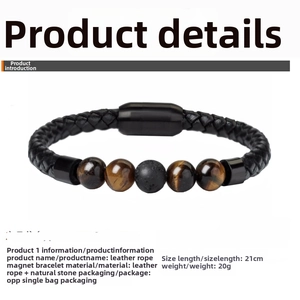 Detail of 8mm tiger eye stone beads and black braided leather strap with magnetic clasp