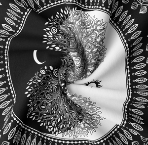 Close-up of tree of life and yin yang mandala tapestry with detailed woven texture