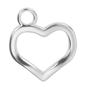 Close-up of heart-shaped hollow pendant in polished silver stainless steel with hanging ring