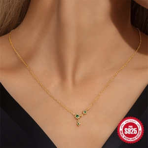 S925 sterling silver gold necklace with starburst pendant and green gemstone inlay