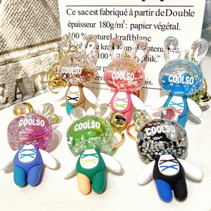 Set of 6 colorful acrylic quicksand rabbit keychains with liquid glitter and bells