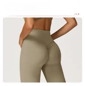 Detail of high waisted yoga flare pants with V-cut waistband and scrunch butt lifting design
