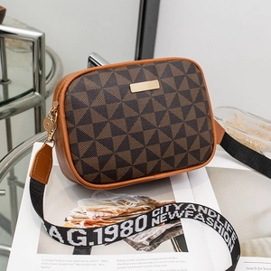 Modern brown geometric patterned crossbody camera bag with wide printed canvas strap