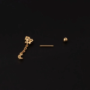 Gold moon pendant chain earring set with colorful zircon on a black background