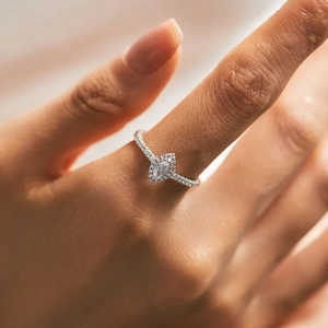 Elegant marquise-cut halo ring in 925 sterling silver with sparkling pave stones