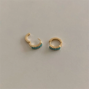 Detail showing gold huggie earrings with turquoise rectangle stones in open and closed view