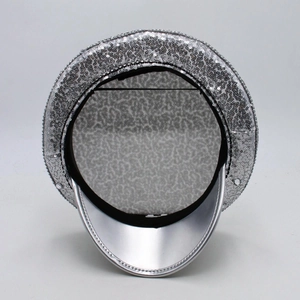 Detailed interior view of silver sequin captain hat showing gray textured lining and brim
